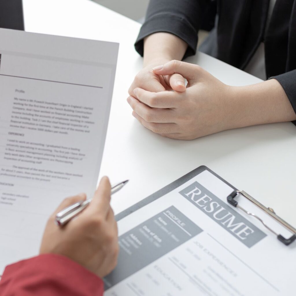 person reviewing a candidate resume